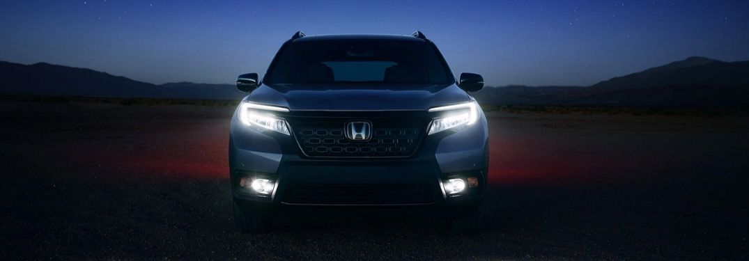 2021 Honda Passport Modern Steel Metallic with LED headlights on