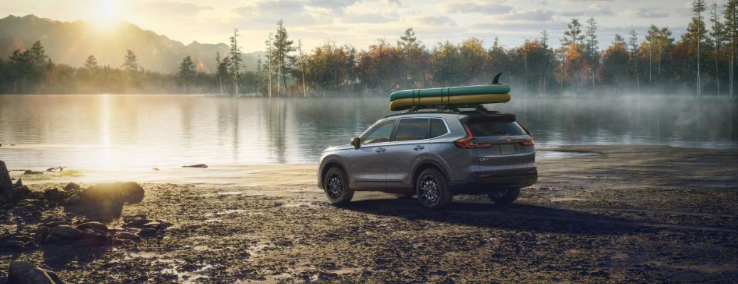 2023 Honda CR-V Hybrid parked near a lake