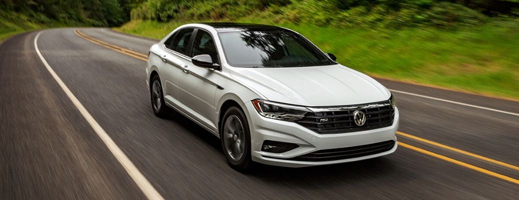 2020 Volkswagen Jetta driving down a rural road