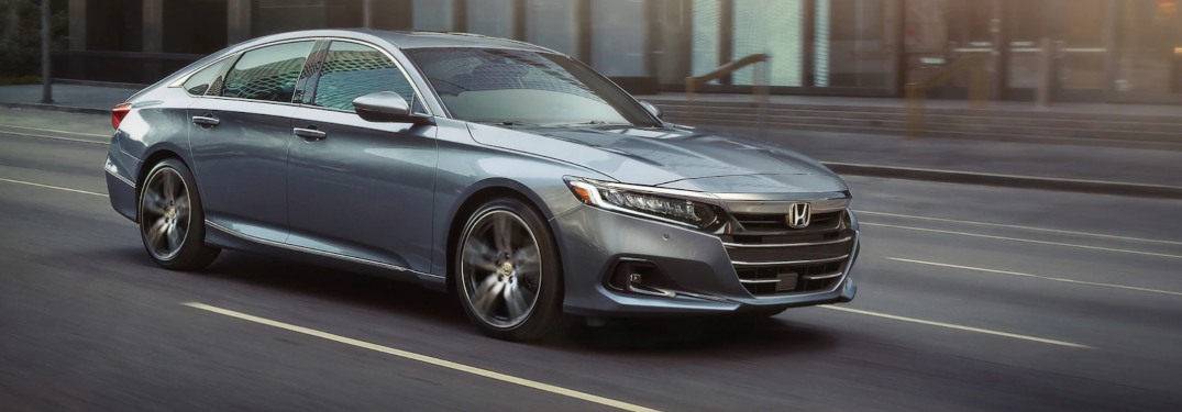 2021 Honda Accord driving down a city street