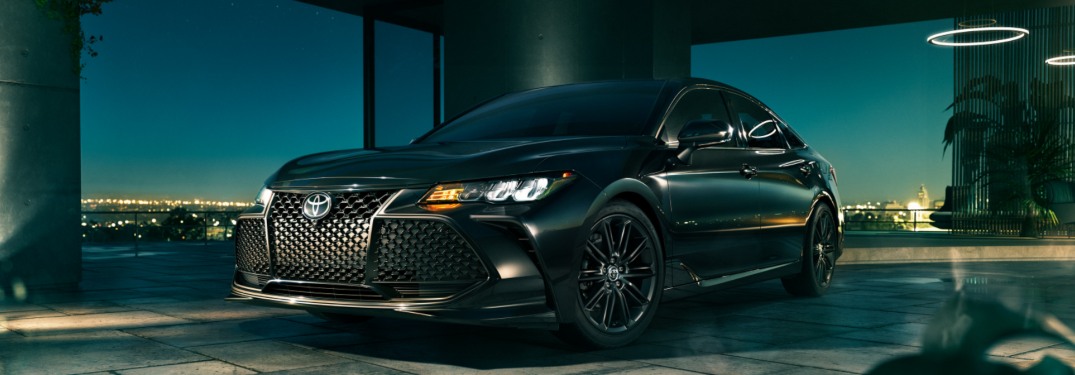2021 Toyota Avalon parked underneath an archway on a balcony