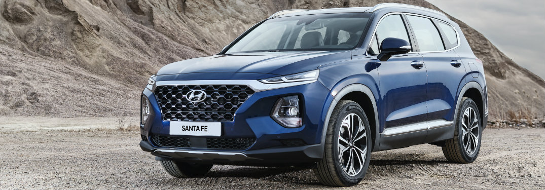 Side view of a blue 2019 Hyundai Santa Fe