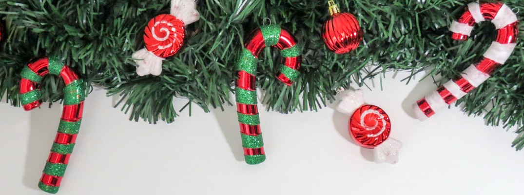 holly candy canes swirly candies white background