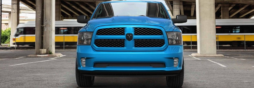2020 Ram 1500 Classic Express trim level blue parked in front of train facing shot
