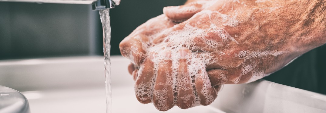 hands washing coronavirus pandemic water soap sink