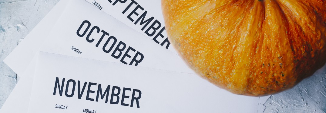 stock photo of calendar pages and pumpkin