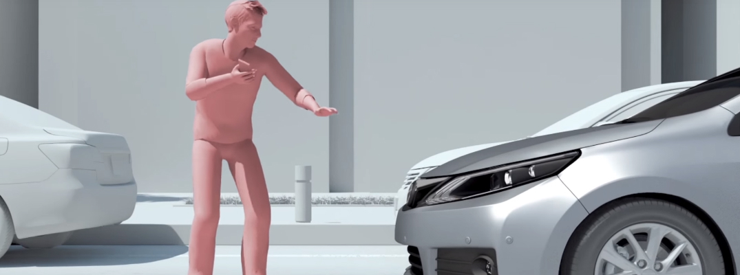 Graphics of a Toyota Vehicle Stopping in Front of a Pedestrian