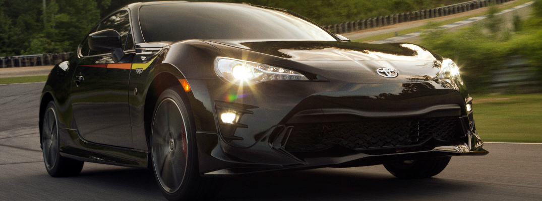 Front View of a Black 2019 Toyota 86 Driving on a Race Track
