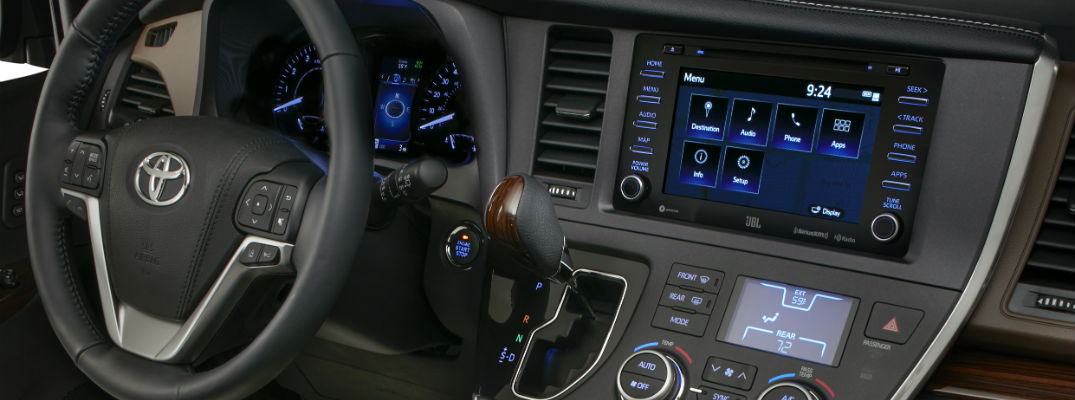 A close up photo of the dashboard in the 2018 Toyota Sienna and its technology.