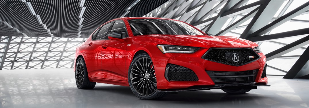 Front passenger angle of a red 2021 Acura TLX Type S