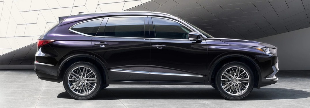 Passenger angle of a dark grey 2022 Acura MDX