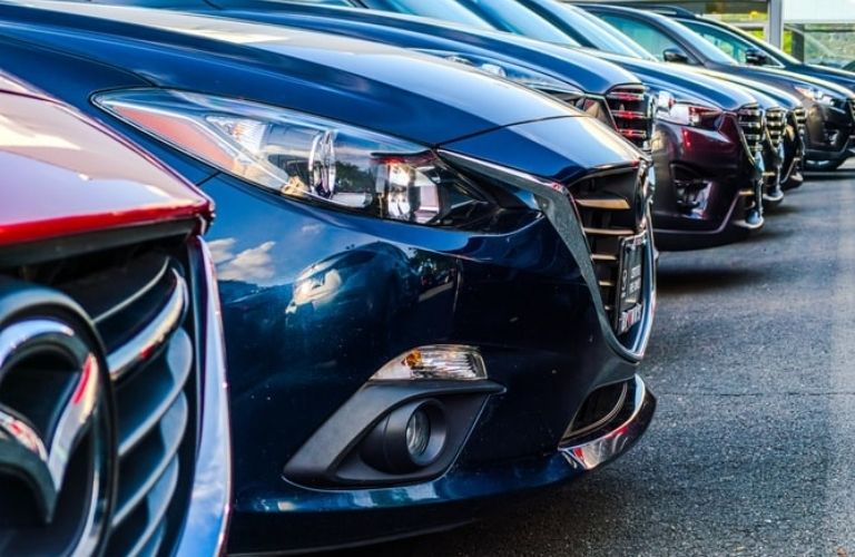 Used cars parked in a parking lot