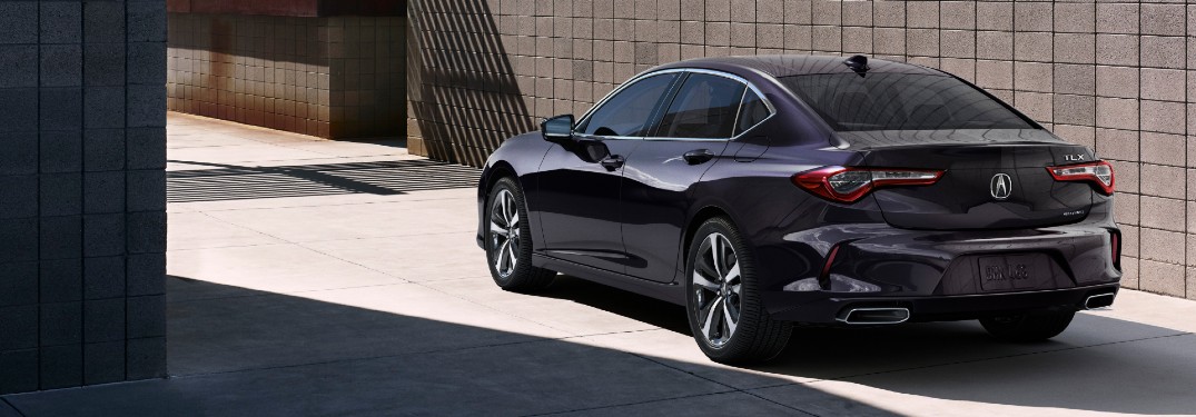 Rear driver angle of a grey 2021 Acura TLX