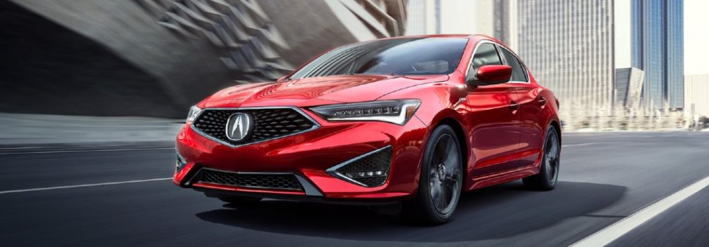 Front driver angle of a red 2021 Acura ILX