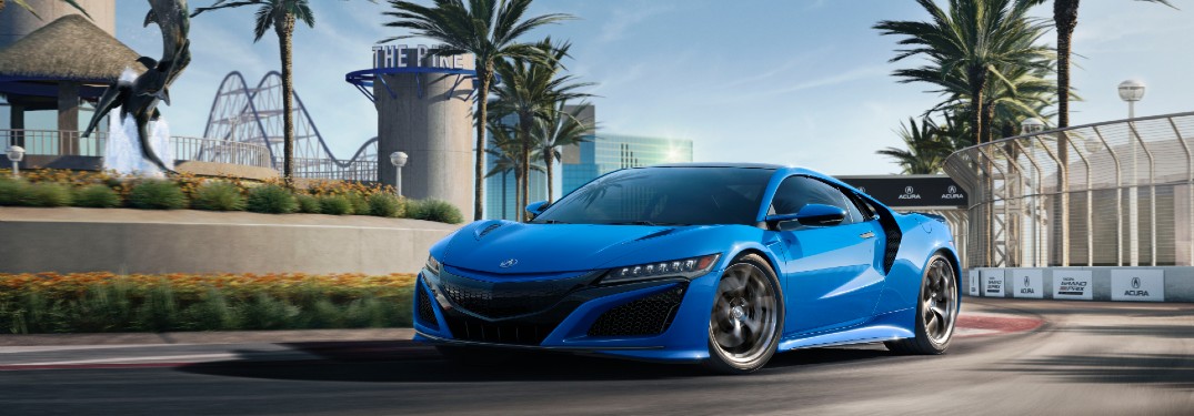 Front driver angle of a blue 2021 Acura NSX