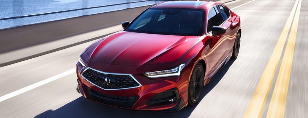 2022 Acura TLX Red driving on the road