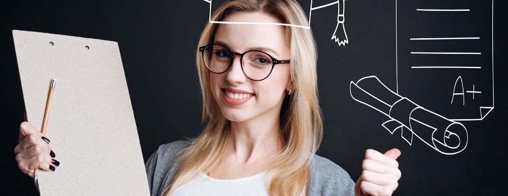 A smiling woman holding clipboard
