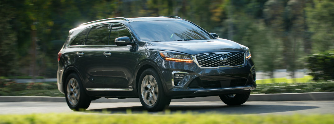 A right front quarter photo of the 2019 Kia Sorento on the road.