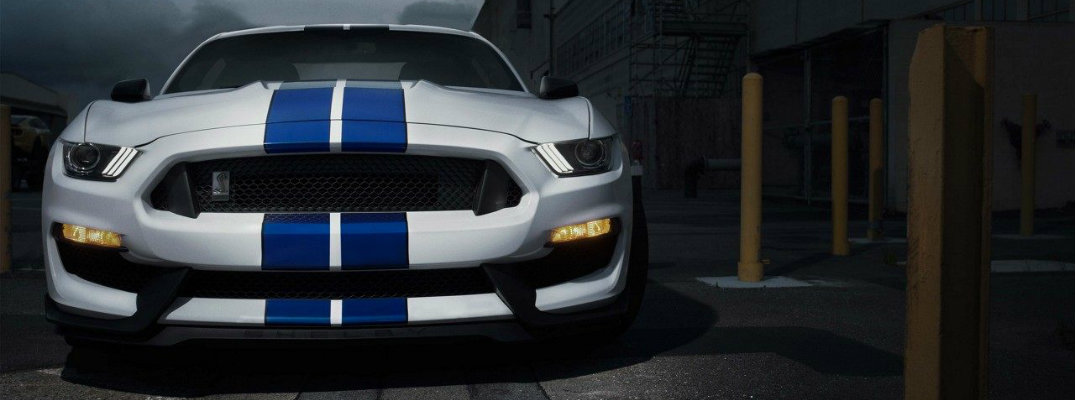 Shot of blue and white striped 2018 Ford Mustang Shelby GT350 at night