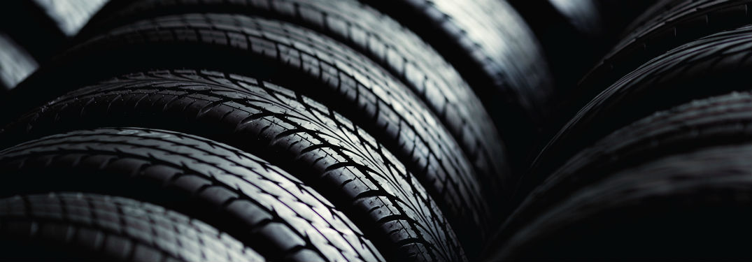 close up of large stack of tires