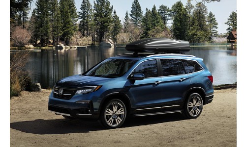 2019HondaPilotexteriorshotbluepaintjobparkedona