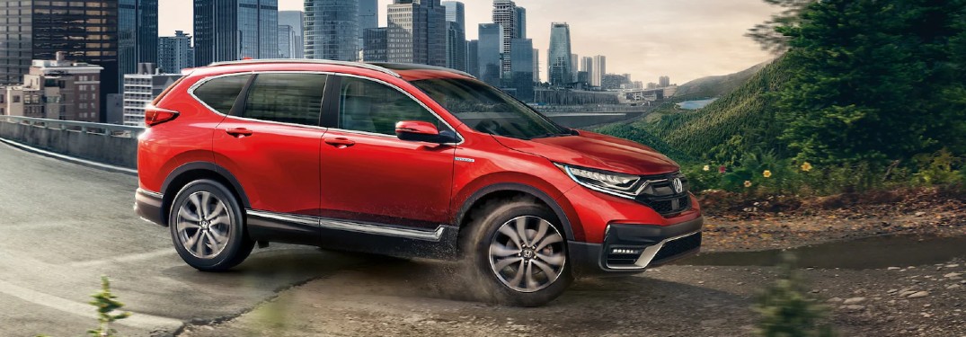 Orange 2020 Honda CR-V on Blacktop and Dirt Road
