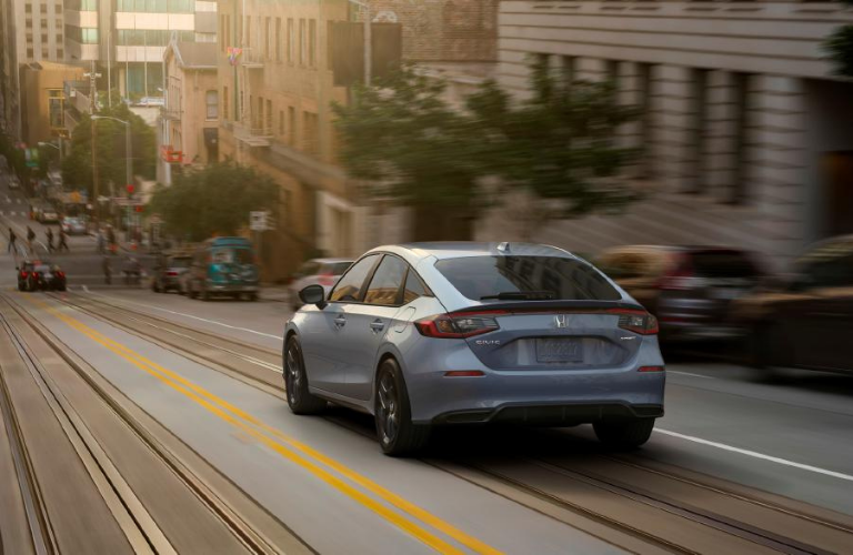 2022 Honda Civic Hatchback from the back on road.