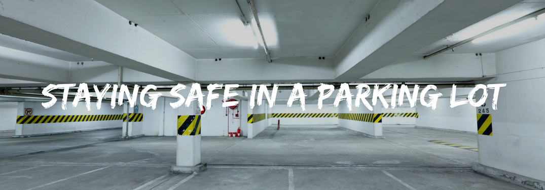 Image of a parking garage with text reading staying safe in a parking lot over top