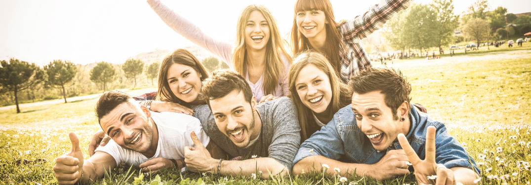 Fun Attractions in South Attleboro, MA with image of happy group of friends