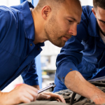 Mechanics checking a vehicle-yt-A_b
