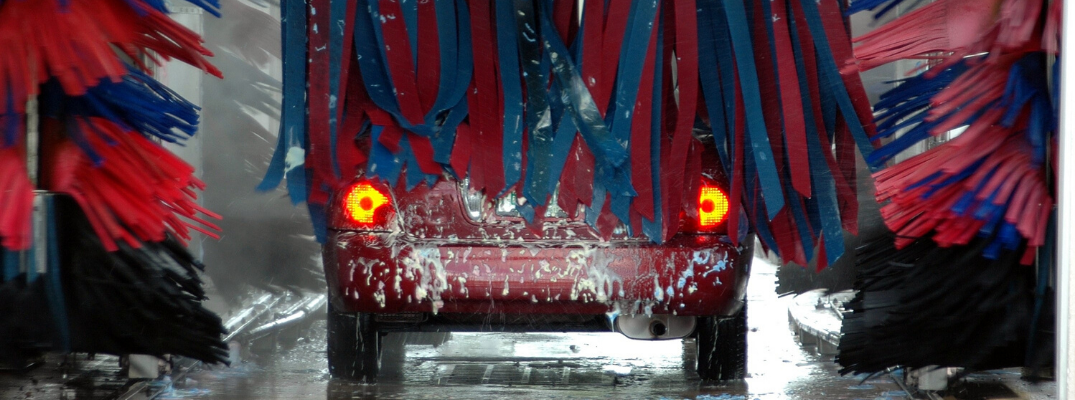 Rear view of vehicle going through car wash