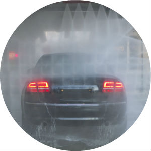 Circle image of vehicle going through car wash