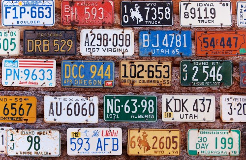 wall of old license plates from different states