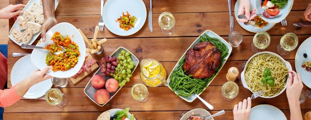 A stock photo of a table set of Thanksgiving dinner.