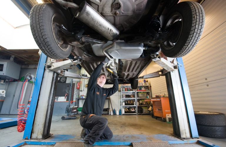 Mechanic working on the vehicle