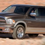 Front three-quarter view of the 2009 Dodge Ram driving_o
