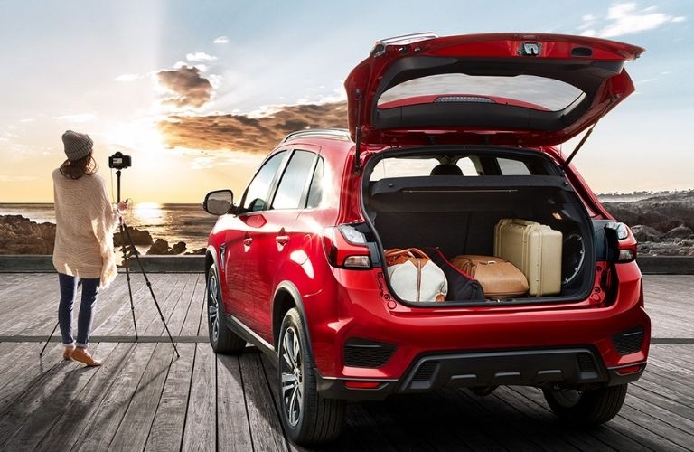 2022 Mitsubishi RVR side and back view with open back door