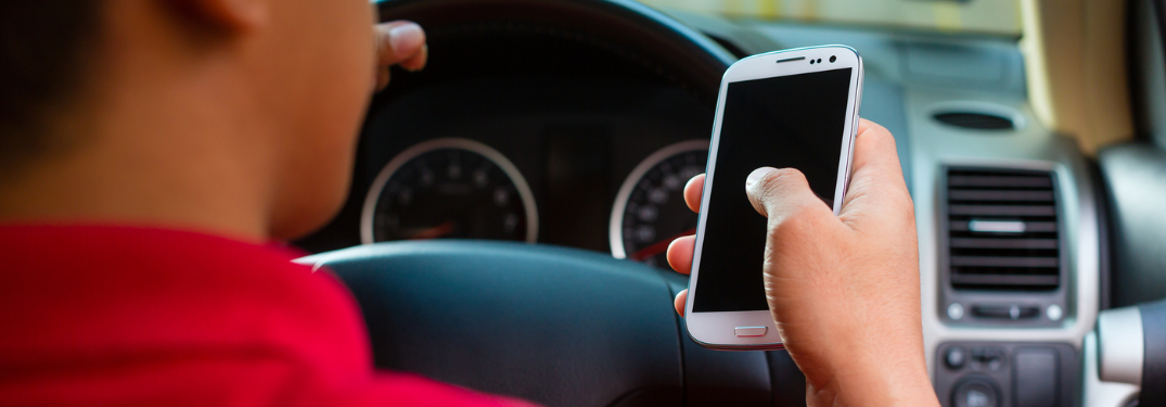 Man using phone in the vehicle