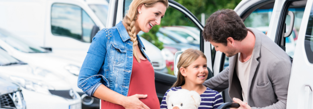 Family near a car