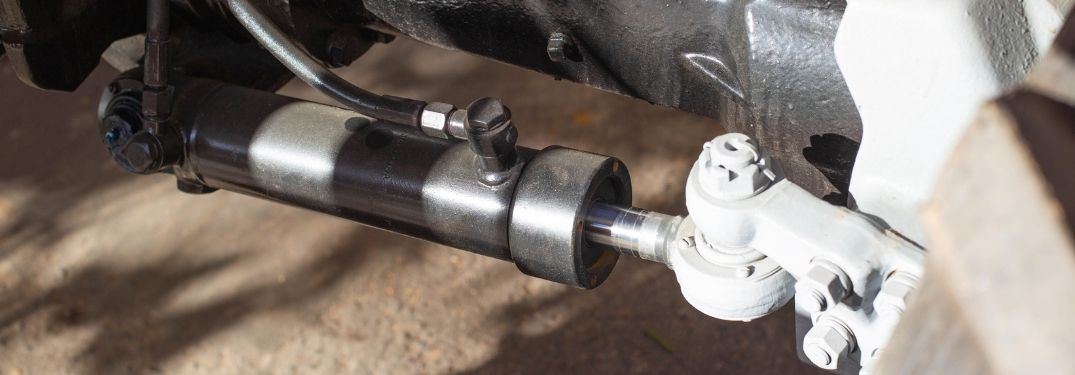 A new power steering pump installed on a vehicle