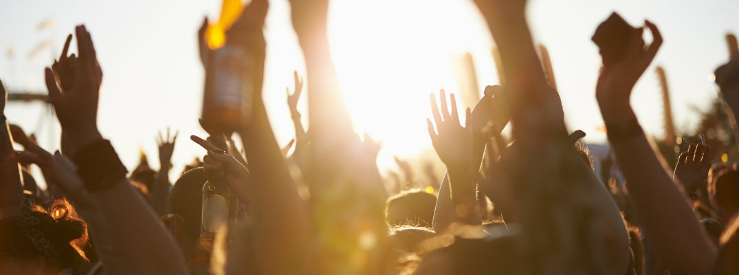 concert crowd enjoying themselves at a music festival
