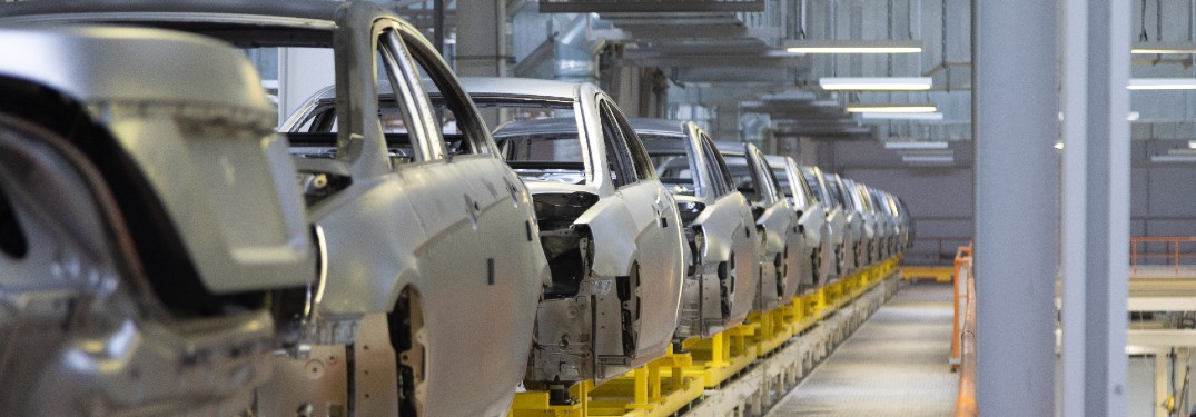 frames of cars in automotive production factory