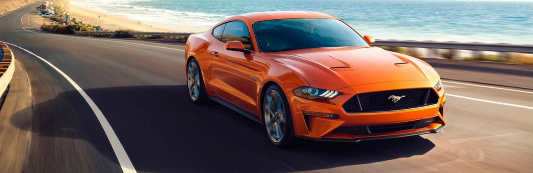 2018 Ford Mustang driving on road.