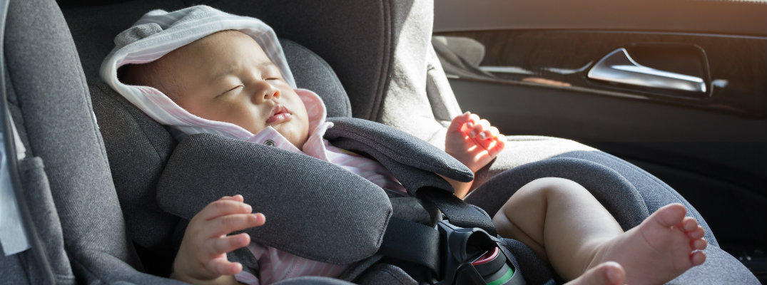 A baby in a car seat