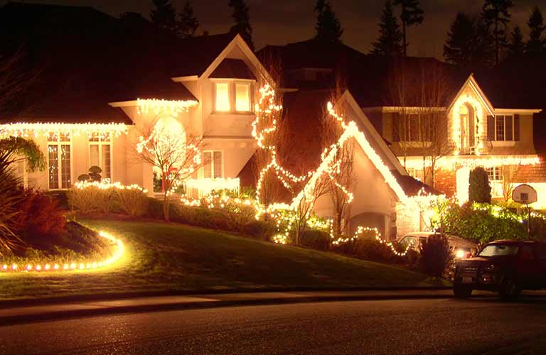 A house covered in holiday lights