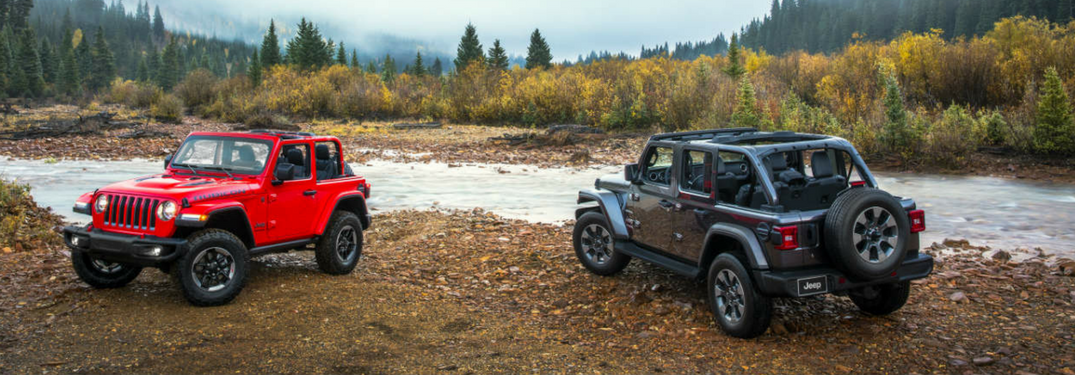 2 2018 Jeep Wranglers by a river