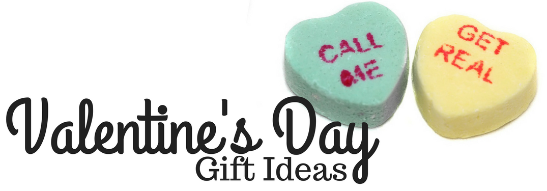 Valentine's Day gift ideas and two candy hearts