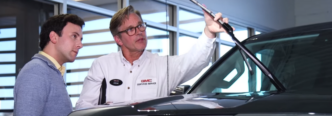 GMC ervice Technician shows driver windshield wiper wear
