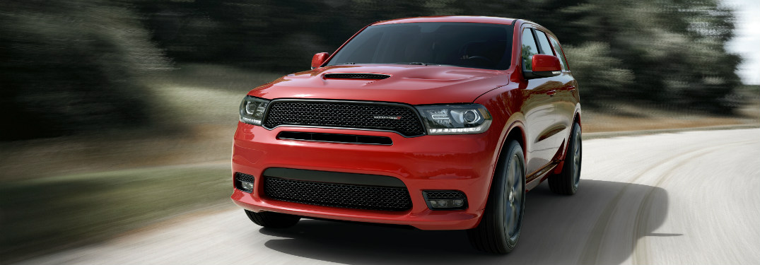 2018 Dodge Durango going fast down a curve