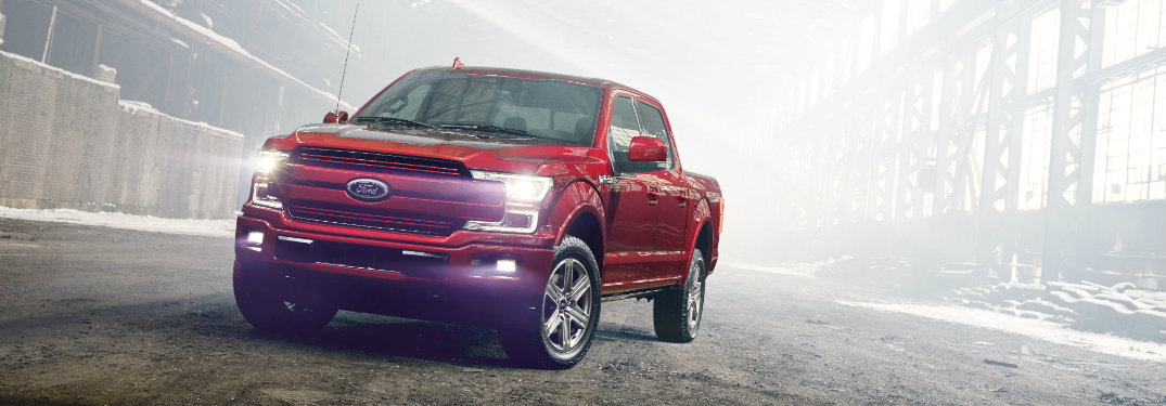Red 2018 Ford F-150 on the road
